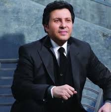 الملك محمد السادس يكرم حسين الجسمي وهاني شاكر